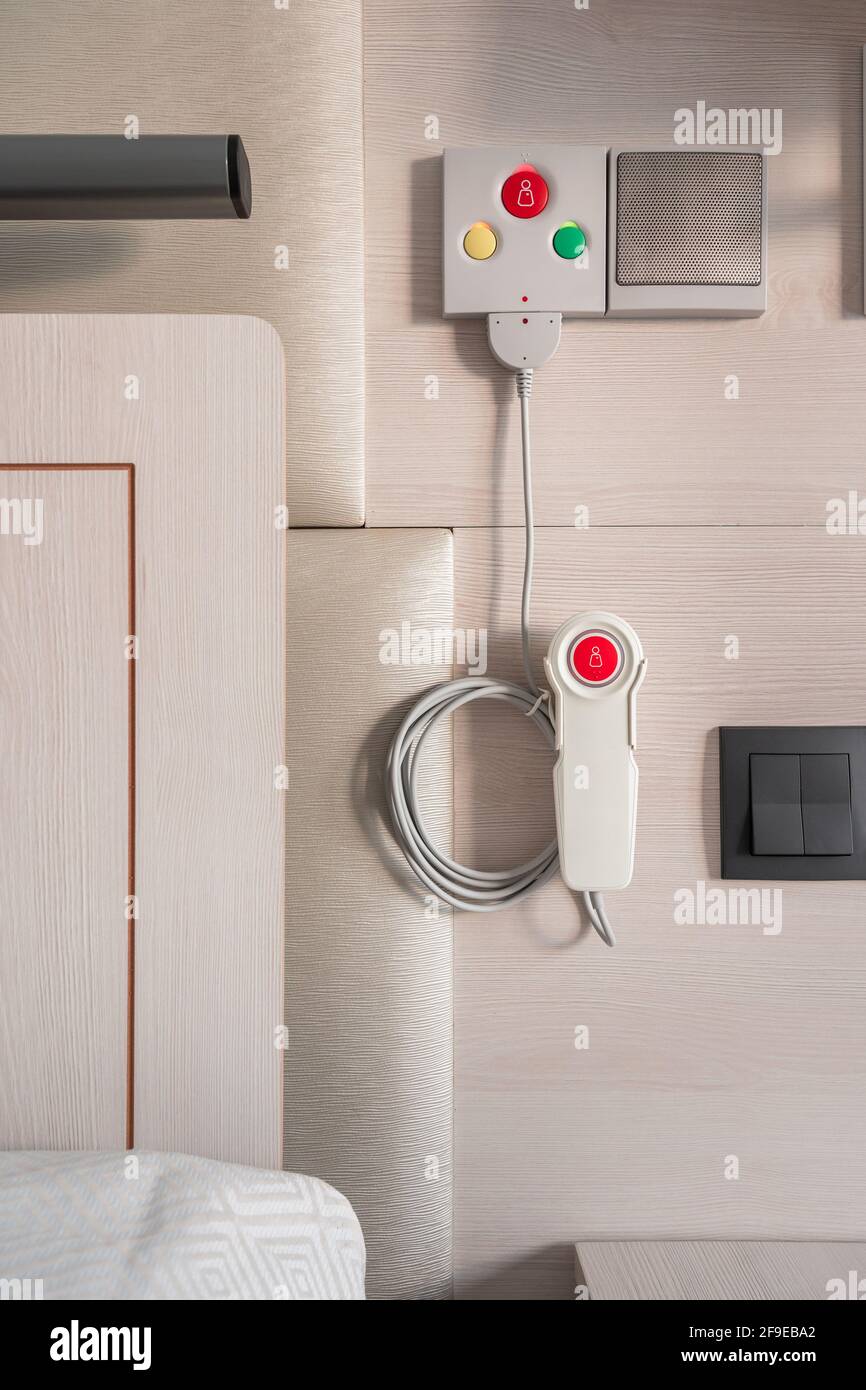Nurse call system with emergency buttons installed near bed in medical