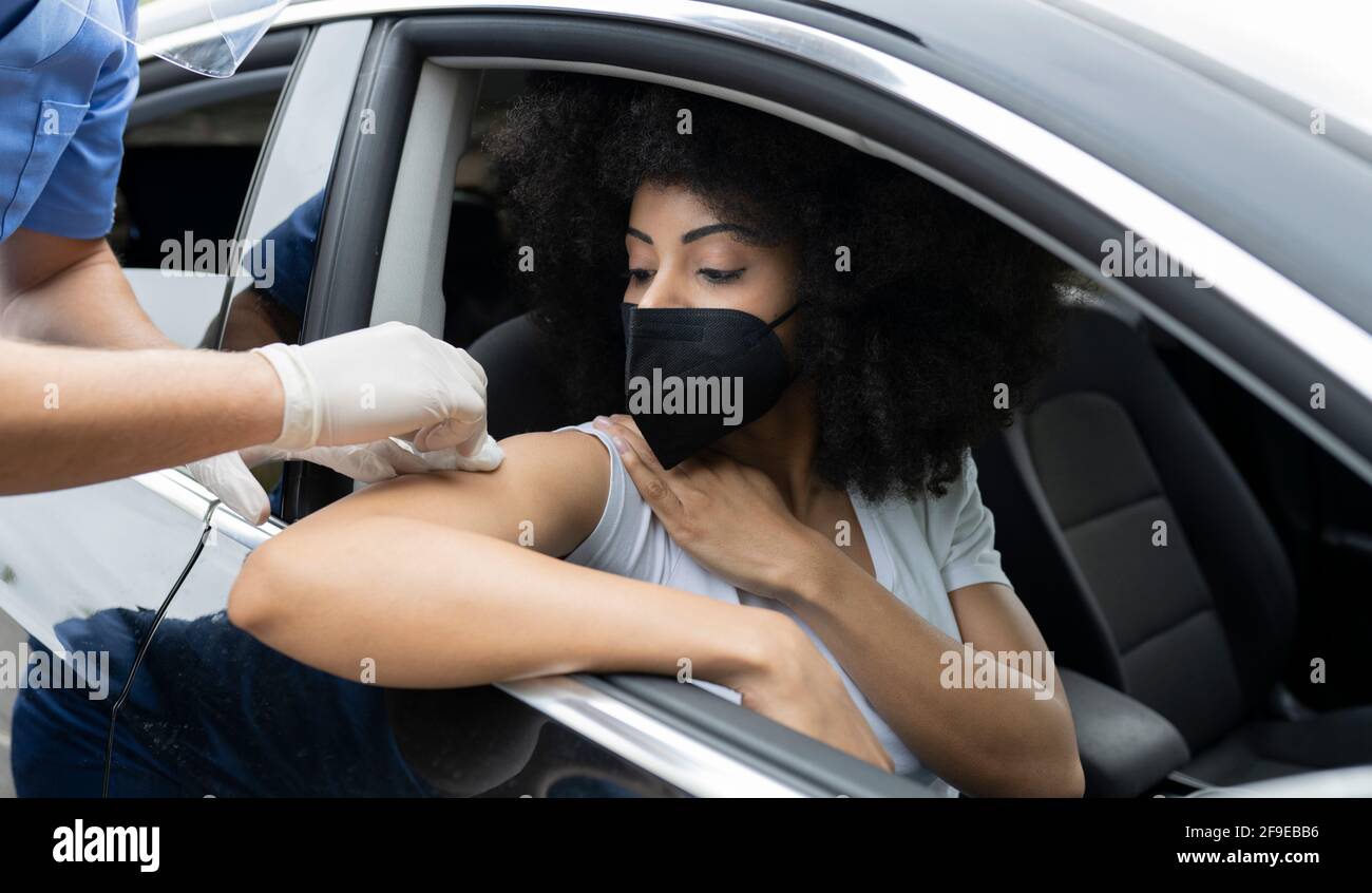 Cropped unrecognizable doctor in protective uniform, latex gloves and ...