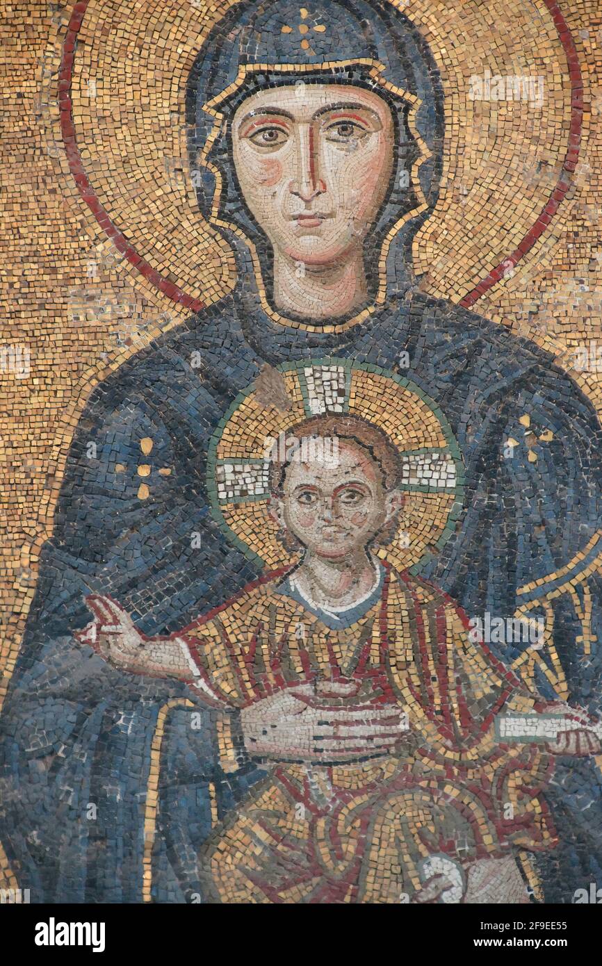 A closeup shot of a Byzantine mosaic of Madonna and child in the