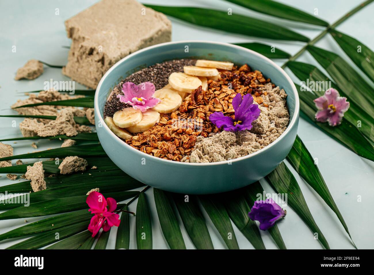 Smoothie bowl with halva bananas seeds and granola Stock Photo Alamy