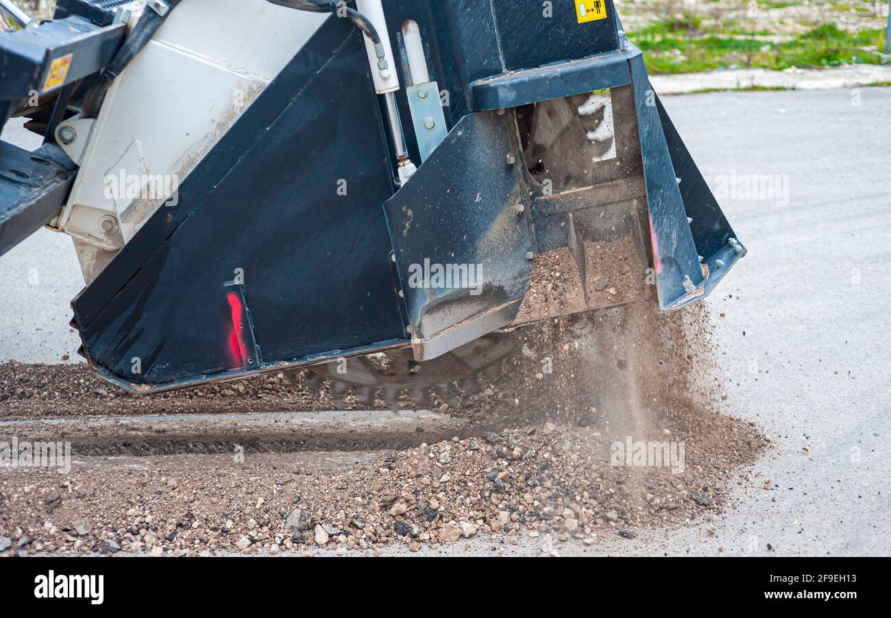 Milling drum for road milling machine. Milling of asphalt for road