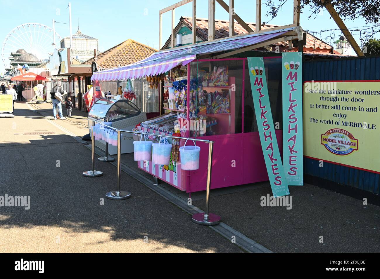 Great Yarmouth promenade with a tradional shop selling candy floss, milk shakes and sweets Stock Photo