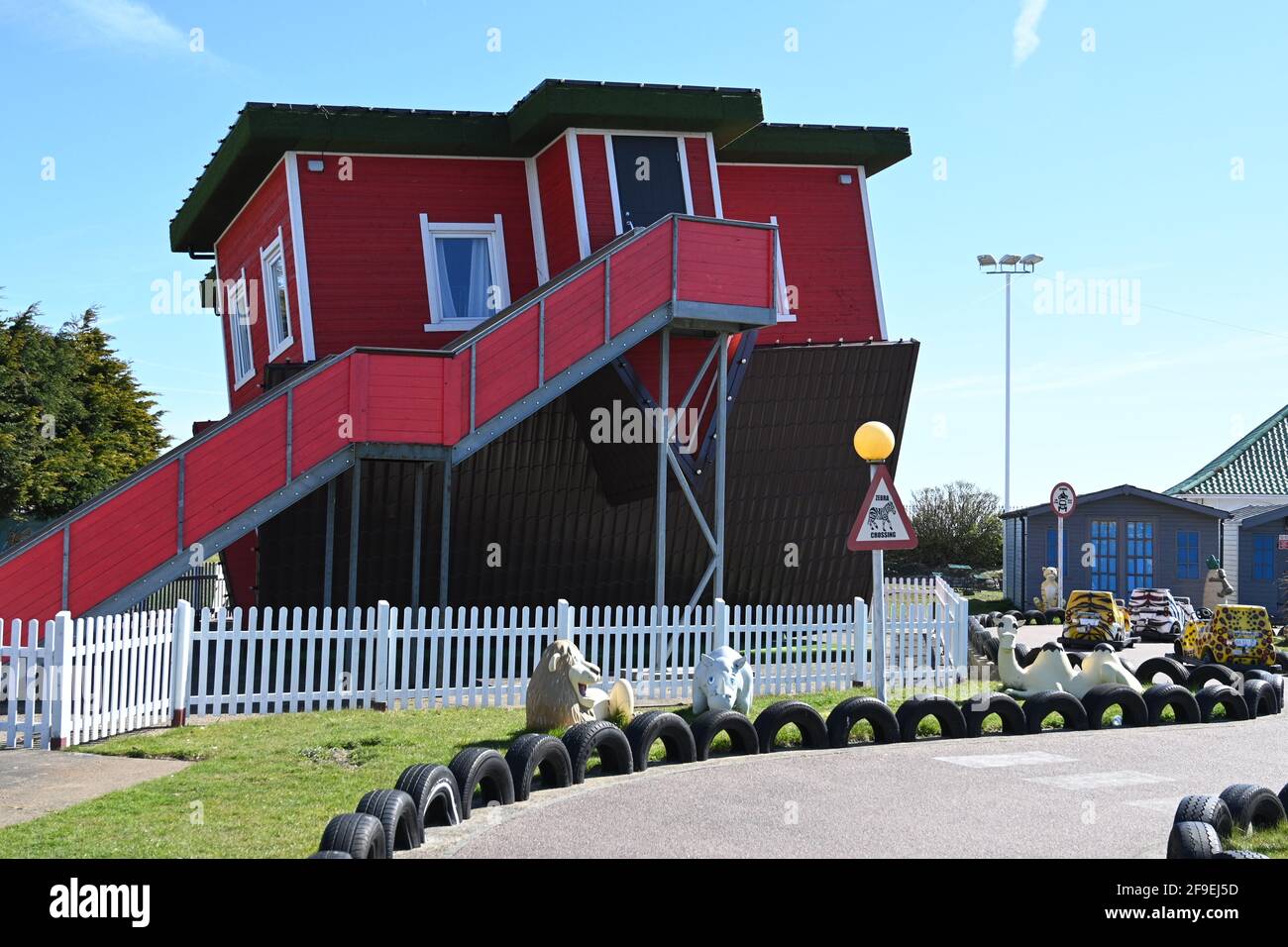 17th April 2021 Great Yarmouth red upside down house on crazy golf course Stock Photo