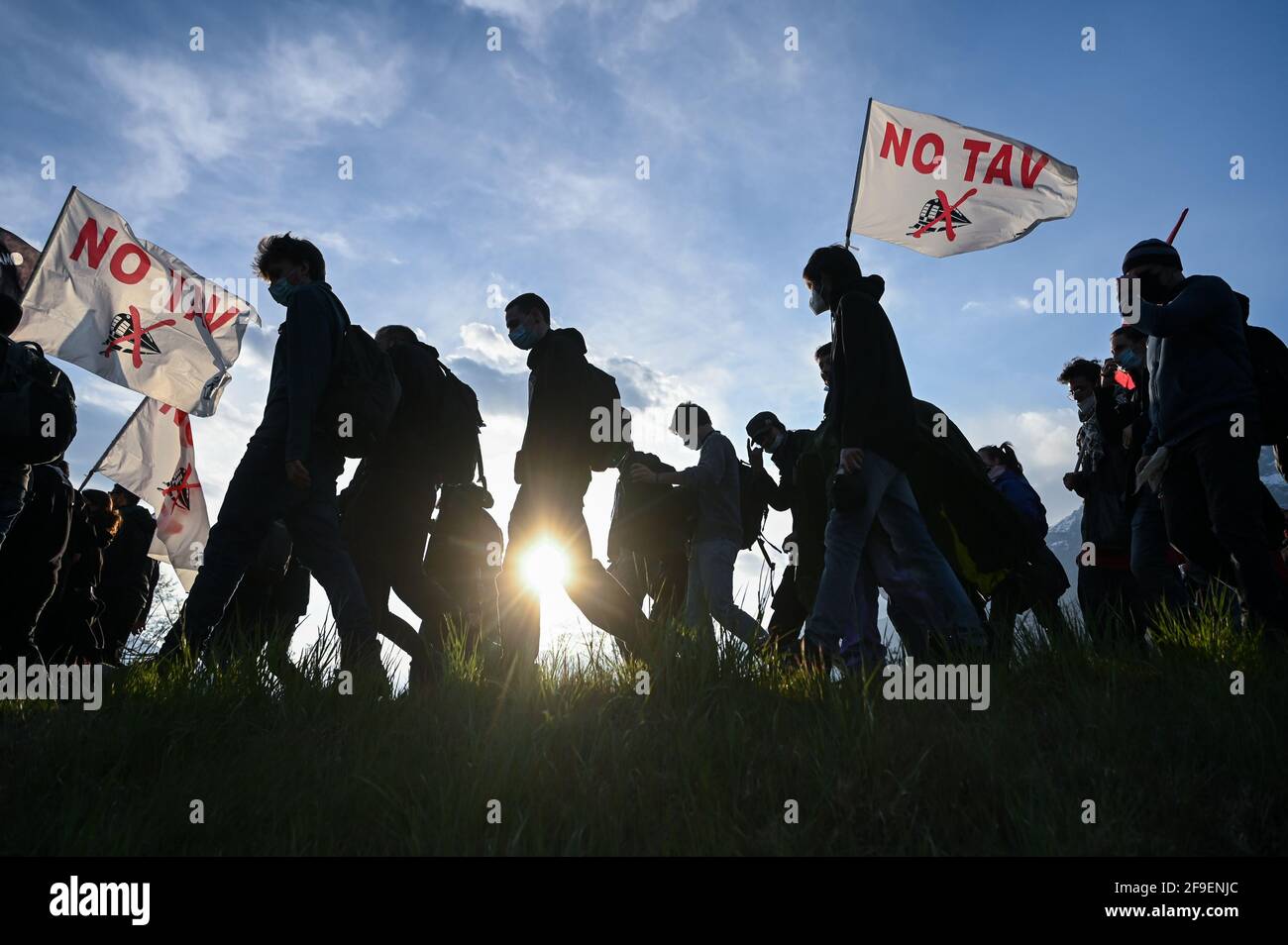 San Didero, Italy - 17 April, 2021: No-tav activists participate in a demo against the project of the new autoport in San Didero, Italy. During the march, the motorway Frejus Turin-Bardonecchia was also blocked, temporarily suspending traffic. Stock Photo