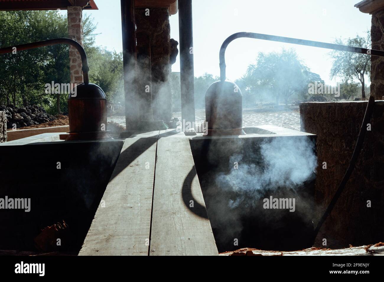 A traditional tequila distillation with smoke coming out Stock Photo