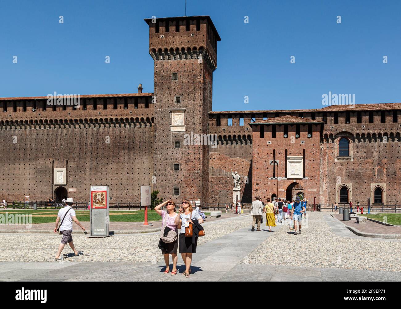 Milan, Milan Province, Lombardy, Italy.  Sforzesco Castle.  Castello Sforzesco.  Piazza d'Armi or Parade Ground and the Torre di Bona. Stock Photo