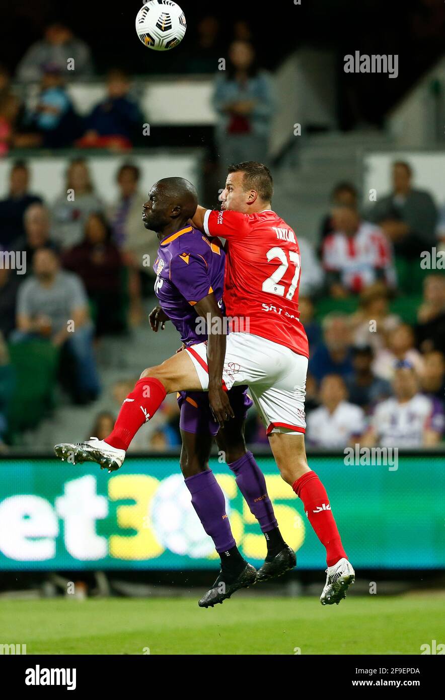 Perth, Western Australia. 18th April 2021; HBF Park, Perth, Western Australia, Australia; A League Football, Perth Glory versus Wellington Phoenix; Steven Taylor of Wellington Phoenix and Jason Geria of the Perth Glory compete for the header Credit: Action Plus Sports Images/Alamy Live News Stock Photo