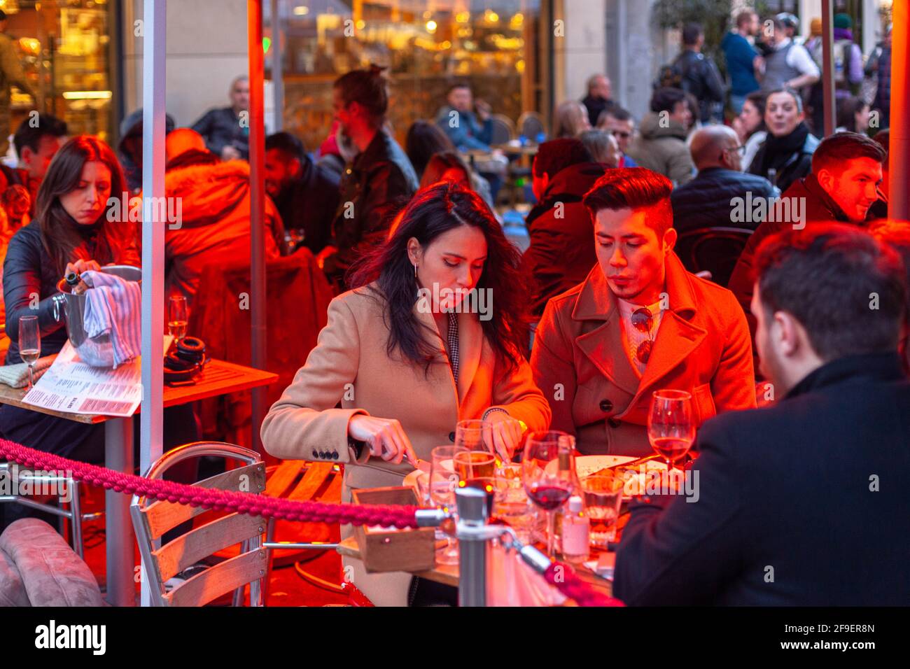 Covered outdoor seating during easing lockdown in Soho, London, England, UK. Stock Photo