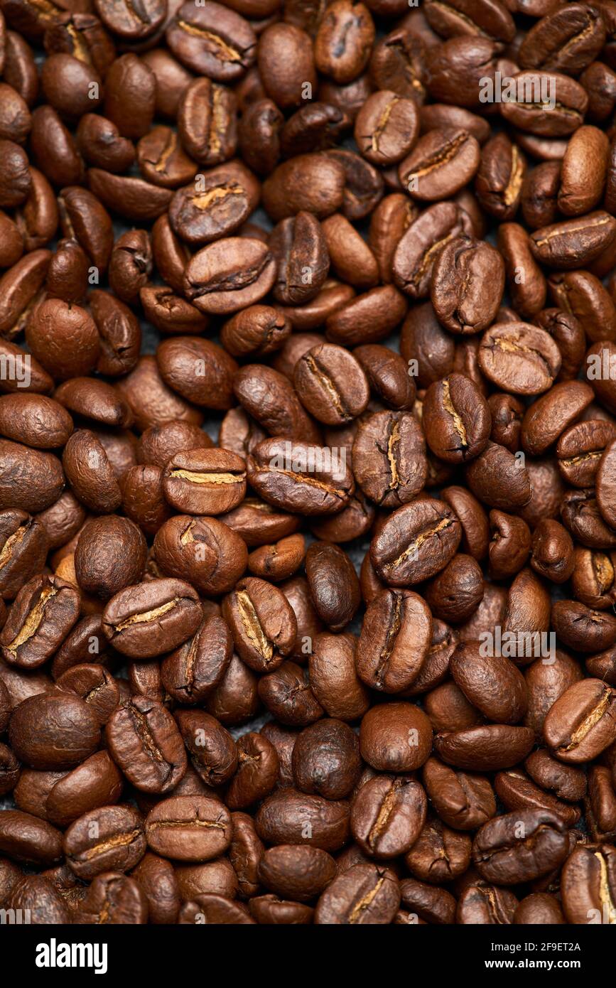 Background or texture made of roasted brown coffee beans Stock Photo ...