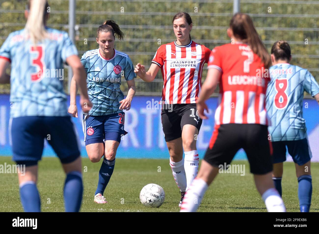 EINDHOVEN, NETHERLANDS - APRIL 18: Eshly Bakker of Ajax and Aniek Nouwen of PSV during the KNVB Beker Women Semi Final match between PSV and Ajax at P Stock Photo