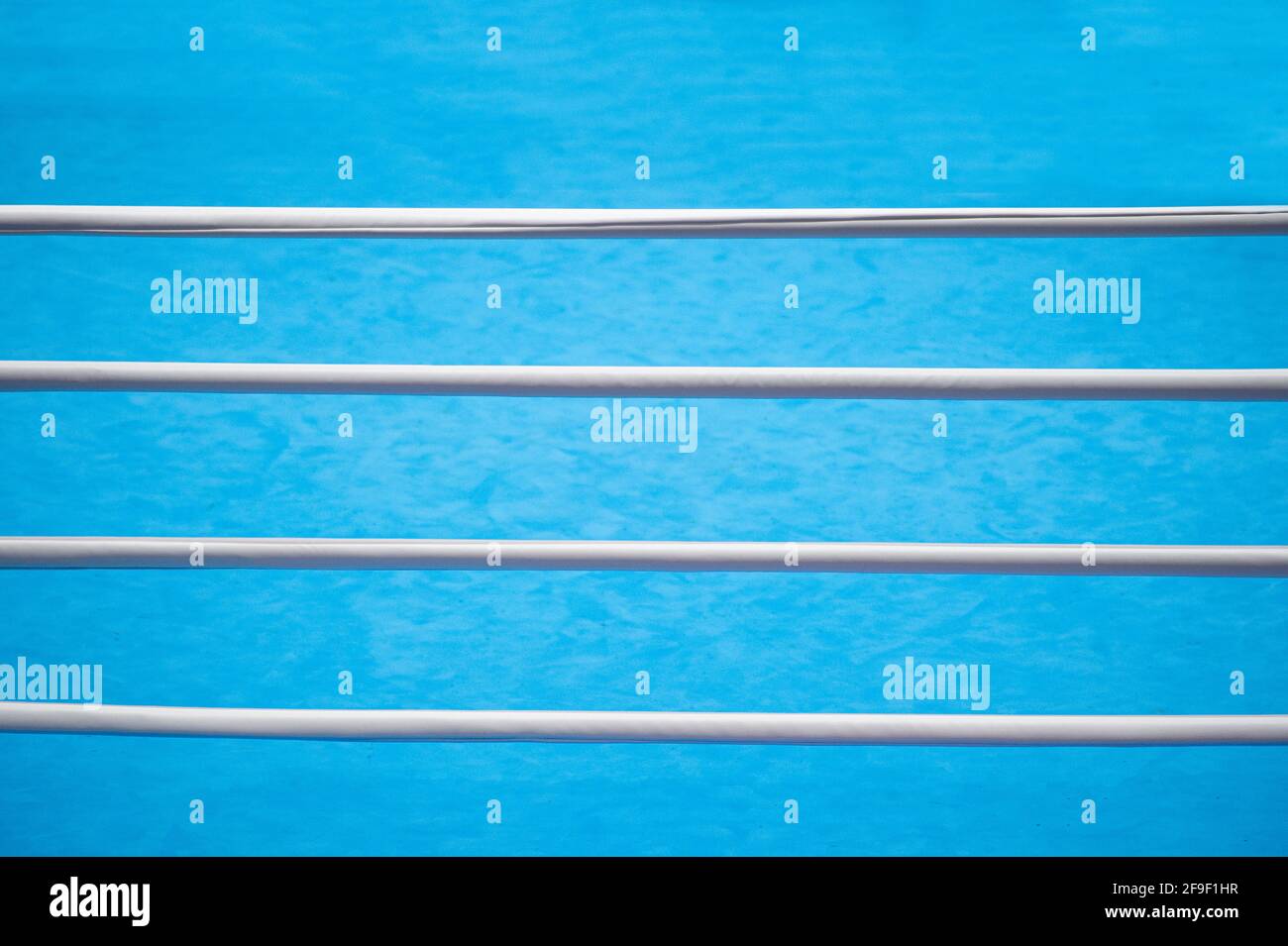 Empty boxing ring abstraction on blue background. professional sport concept Stock Photo