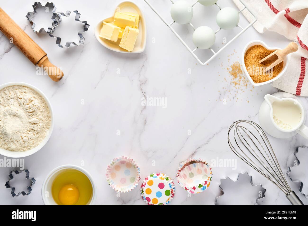 Baking background with flour, eggs, kitchen tools, utensils and cookie ...
