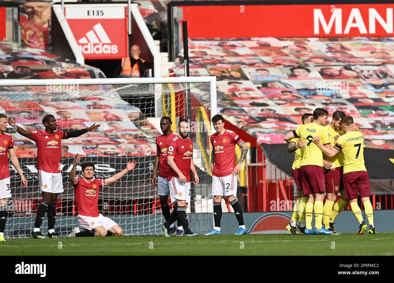 Burnley's James Tarkowski celebrates scoring their side's first goal of the game during the Premier League match at Old Trafford, Manchester. Picture date: Sunday April 18, 2021. Stock Photo