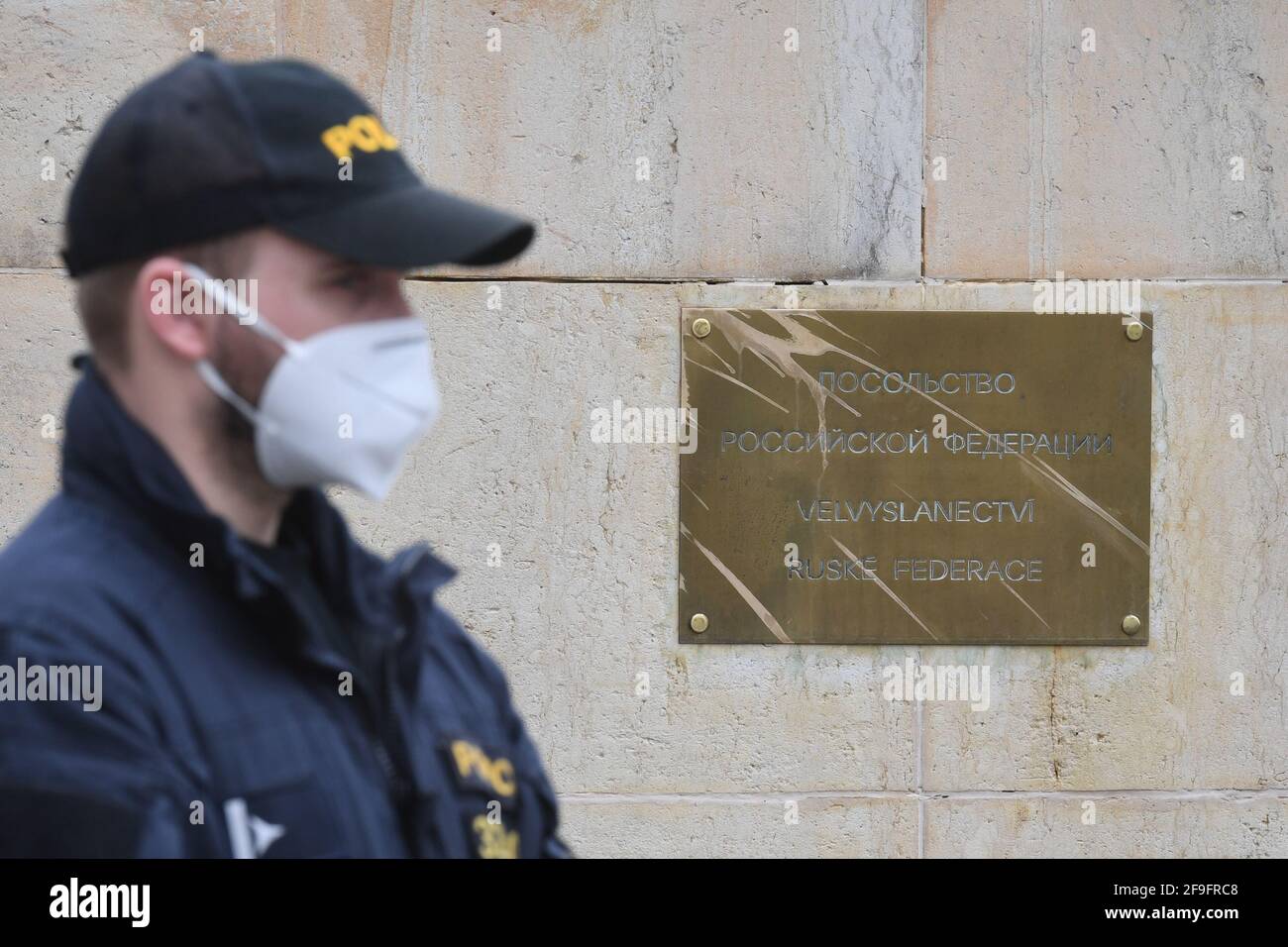 Czech police officer guards an area in front of the building of the Embassy of the Russian Federation in Prague, Czech Republic, on April 18, 2021. Russian secret service GRU members were involved in the explosion of the Czech ammunition store compound in Vrbetice, south Moravia, in 2014, Czech security forces have found out. In reaction, Czechia is expelling 18 members of the Russian embassy staff who were identified as members of Russian secret services. They have to leave Czechia in 48 hours, PM Andrej Babis and Deputy PM Jan Hamacek said on April 17. The night after the announcement of thi Stock Photo