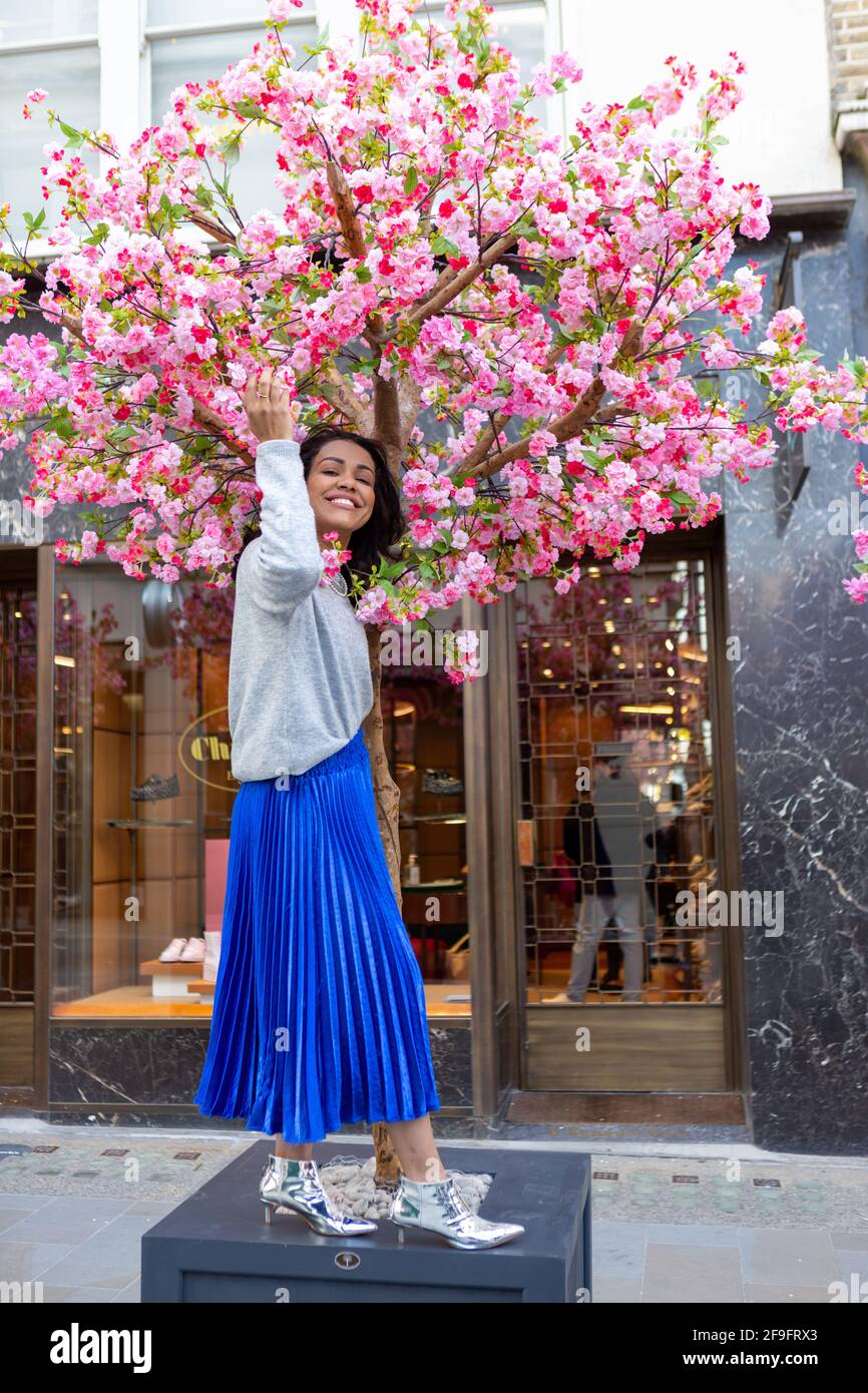 London UK. 17th Apr 2021. A model wearing a H M grey jumper