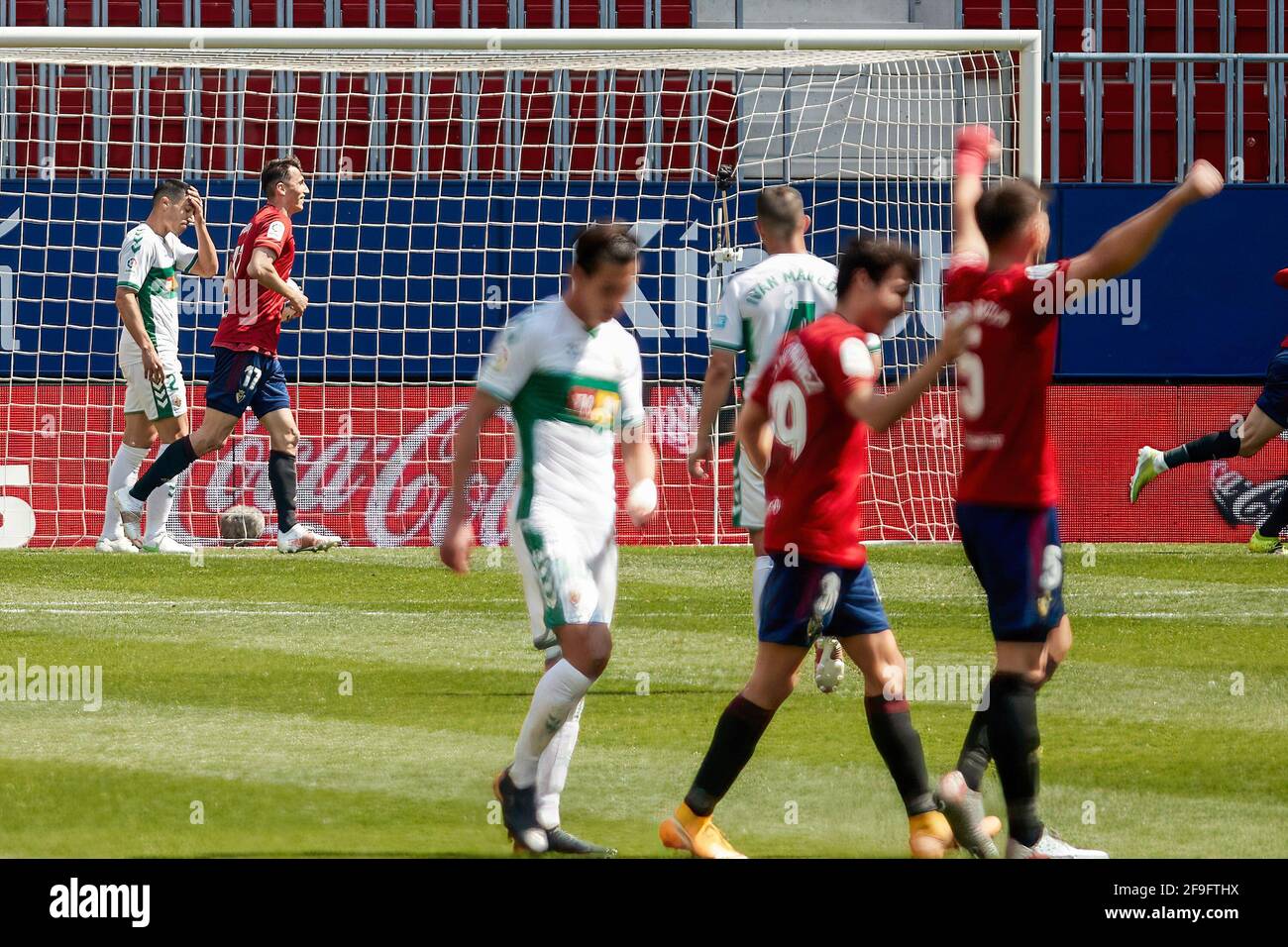 Pamplona, Spain. 11th May, 2021. The referee gives a yellow card to Budimir  during the Spanish La Liga Santander match between CA Osasuna and Cádiz CF  at the Sadar stadium.(Finale Score; CA