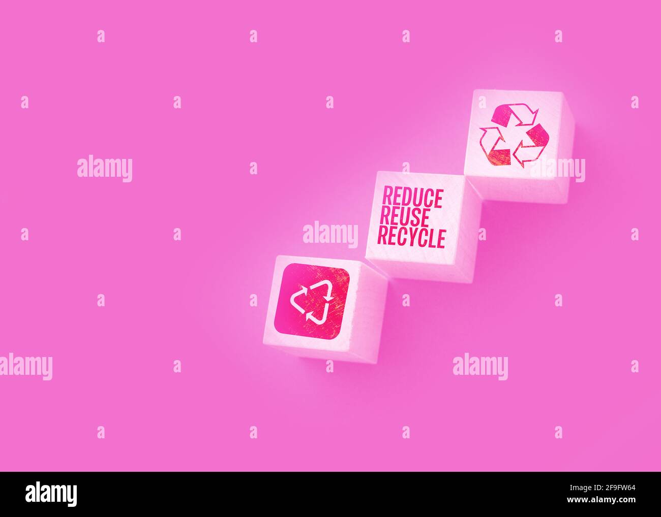 Reduce, reuse and recycle word written on wooden blocks on black. Save ...