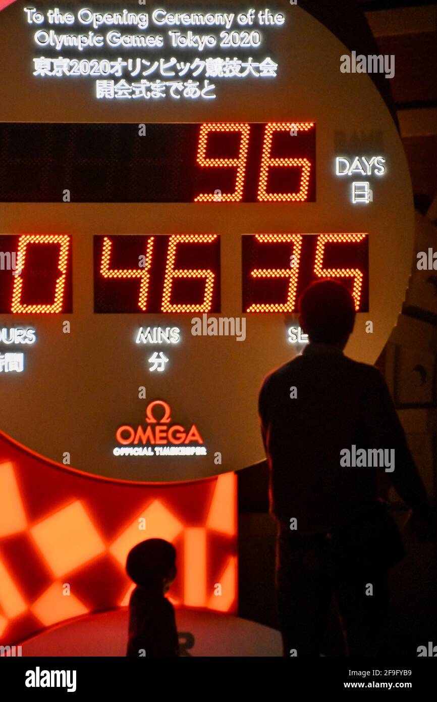 Hachioji, Japan. 18th Apr, 2021. Pedestrian take a photo big countdown clock for the Tokyo 2020 Olympics at Tokyo Station in Tokyo, Japan on Sunday, April 18, 2021. Photo by Keizo Mori/UPI Credit: UPI/Alamy Live News Stock Photo