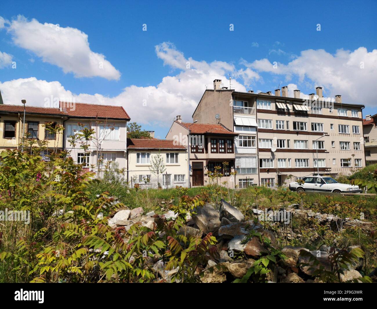A residential building under blue sky and white clouds Stock Photo - Alamy