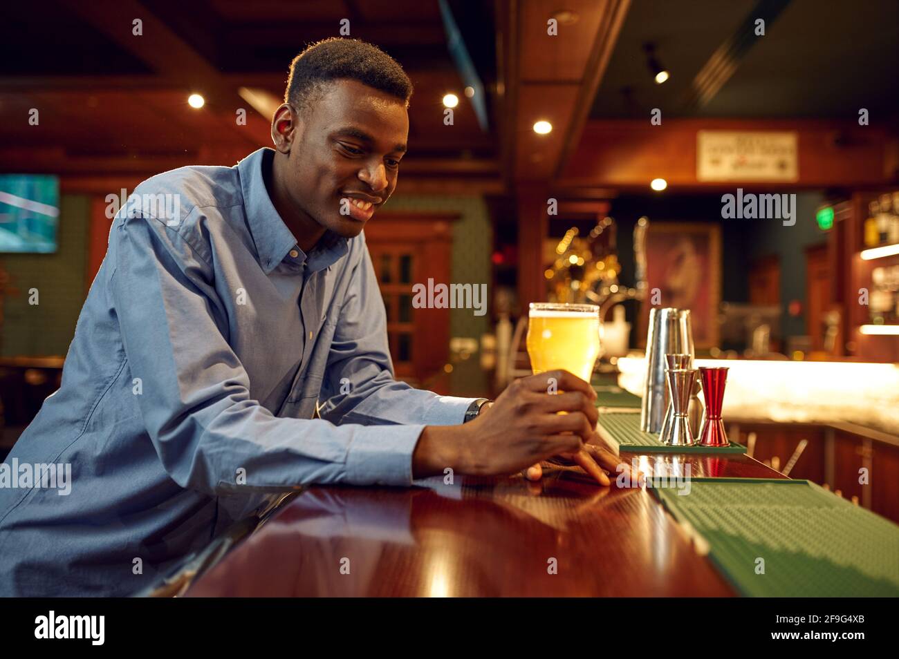 Laughing man sitting counter hi-res stock photography and images - Alamy
