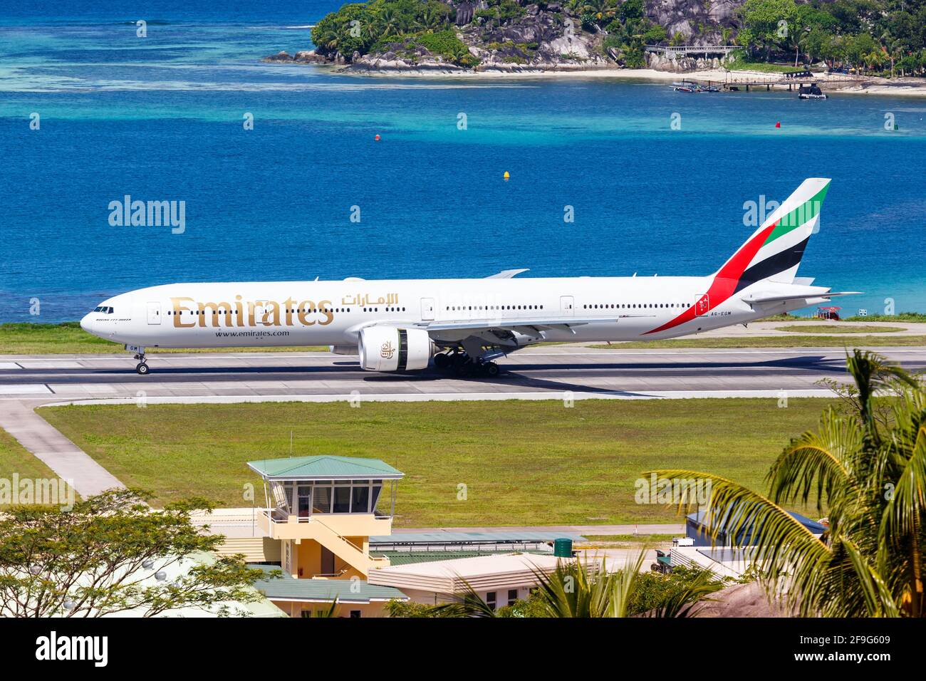 Mahe, Seychelles - November 24, 2017: Emirates Boeing 777 airplane at Seychelles International Airport  (SEZ) in the Seychelles. Boeing is an American Stock Photo