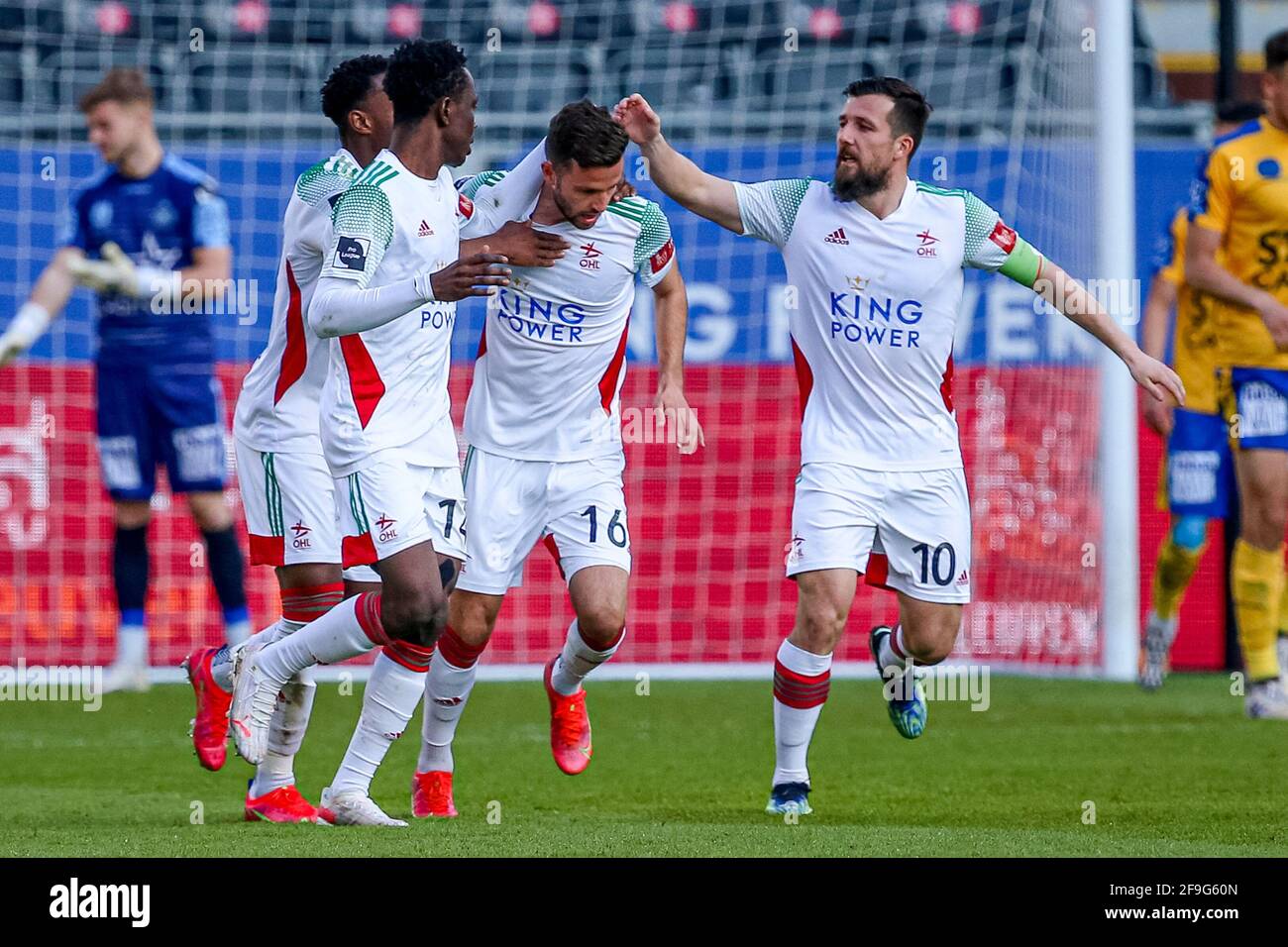 LEUVEN, BELGIUM - APRIL 18: Siebe Schrijvers of OH Leuven celebrating the first goal of his side, with (L) Kamal Sowah of OH Leuven, Xavier Mercier of OH Leuven during the Jupiler Pro League match between OH Leuven and Waasland Beveren at King Power at Den Dreef Stadion on April 18, 2021 in Leuven, Belgium (Photo by Perry van de Leuvert/Orange Pictures) Stock Photo