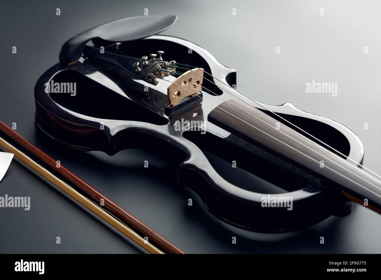 Modern electric violin and bow, closeup view Stock Photo Alamy