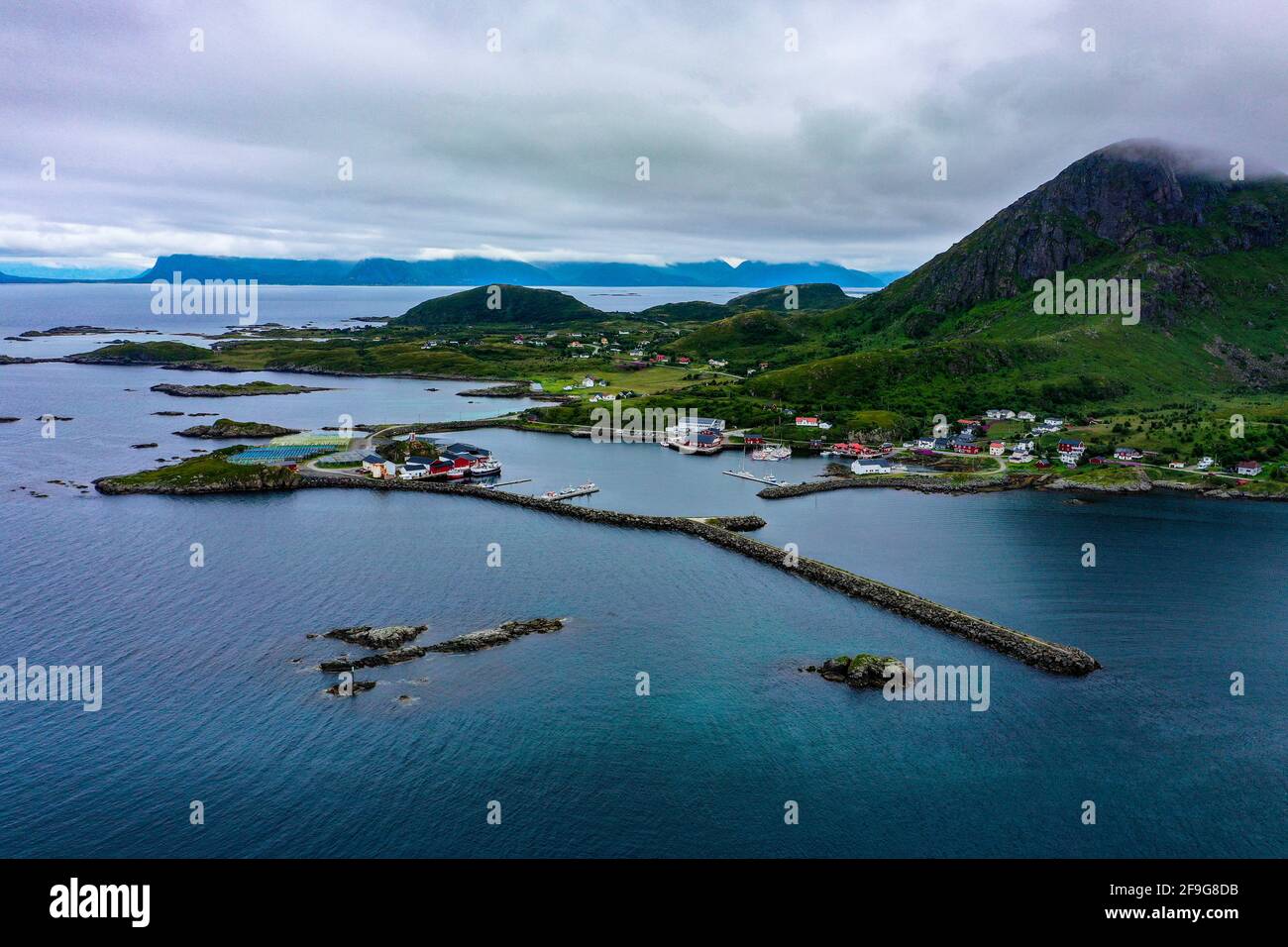 Aerial view of the Sto town at the northern tip of the island of Langoya, in Vesteralen archipelago, cloudy day, in North Norway - drone shot Stock Photo