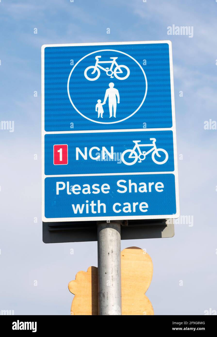 National Cycle Network NCN route 1 sign, Please Share with care, Whitley Bay, north east England, UK Stock Photo