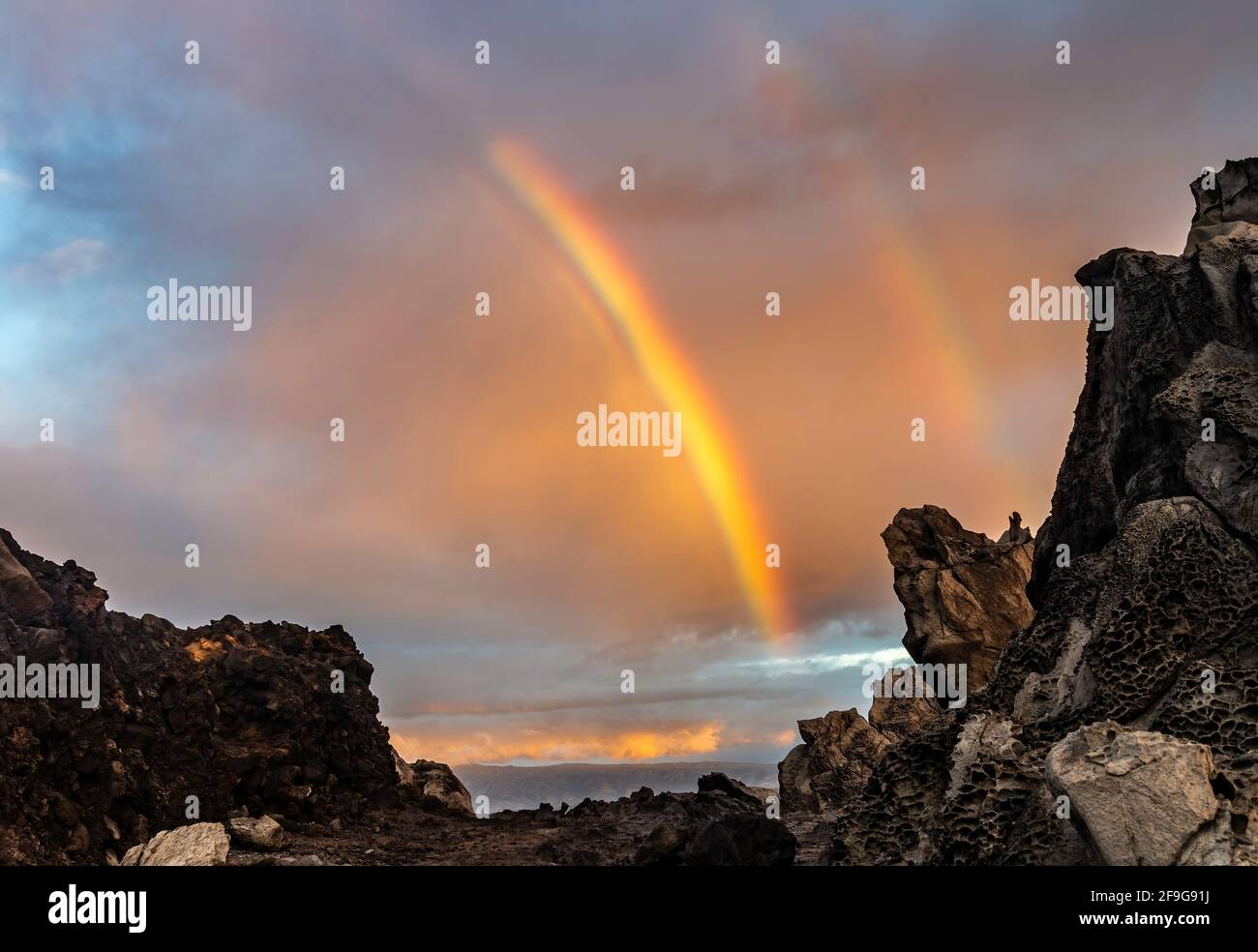 Rainbow over Oneloa Bay, Maui, Hawaii Stock Photo