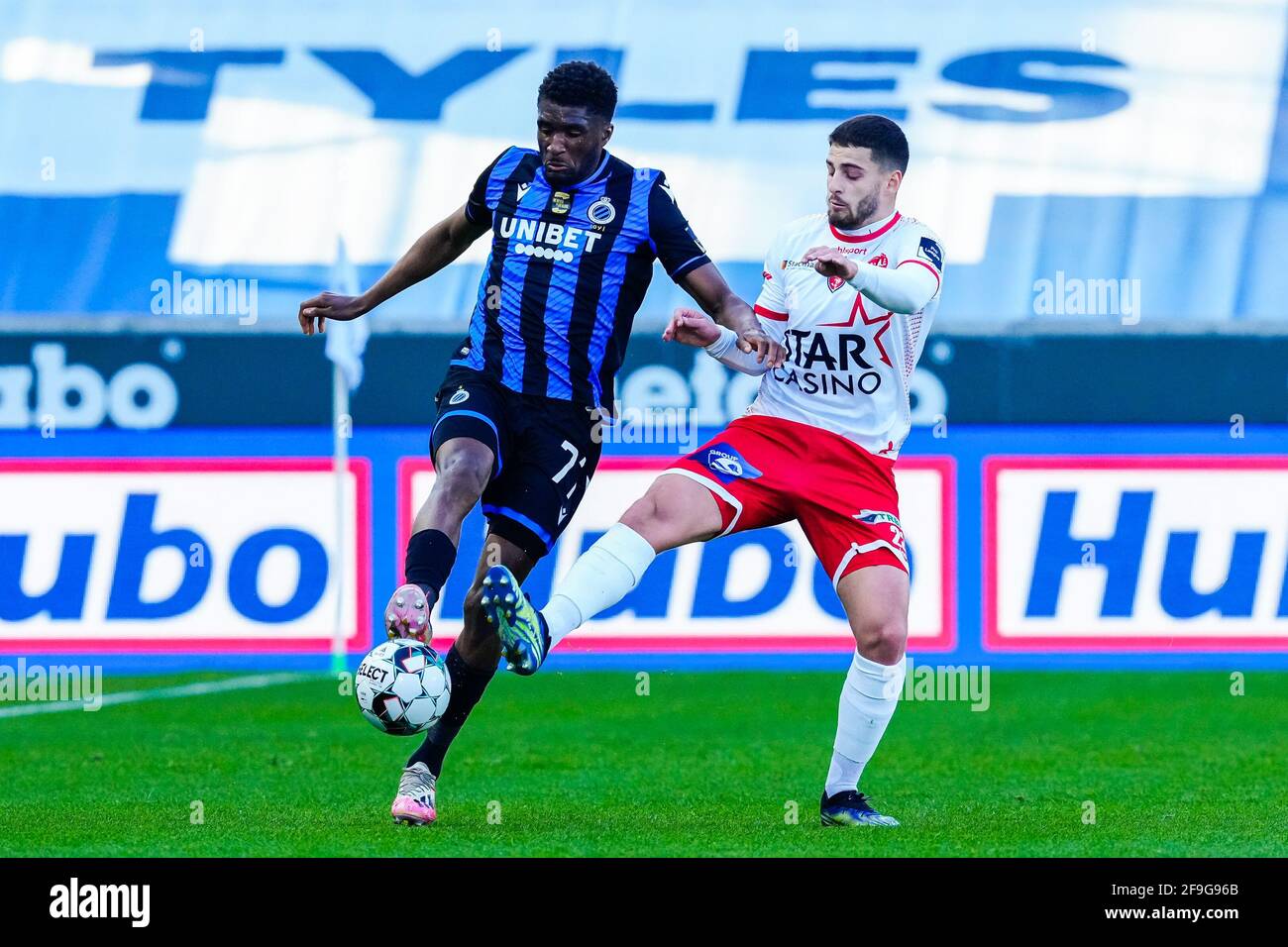 BRUGES, BELGIUM - APRIL 18: Clinton Mata of Club Brugge, Bruno Xadas of Excelsior Mouscron during the Pro League match between Club Brugge and Excelsior Mouscron at Jan Breydel Stadium on April 18, 2021 in Bruges, Belgium (Photo by Geert van Erven/Orange Pictures) Stock Photo