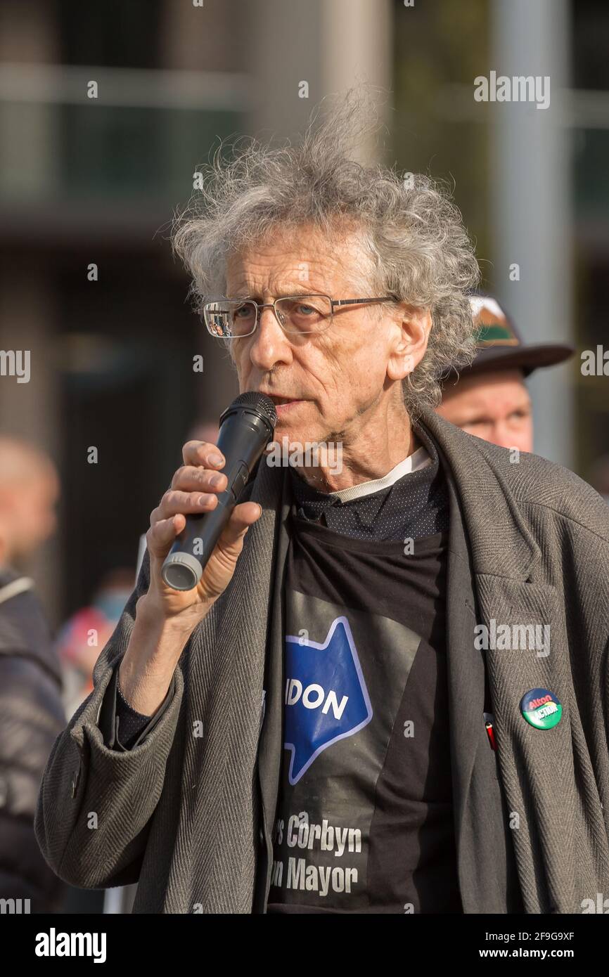 Wembley Park, London, UK. 18th April 2021.  Piers Corbyn, London Mayor candidate, protesting outside Wembley Stadium.  The 'Let London Live' candisate for the London Assembly elections and brother of former Labour leader Jeremy Corbyn is an 'anti vaxxer' who opposes the Vaccine Passport and ‘madness’ of lockdown.  Amanda Rose/Alamy Live News Stock Photo