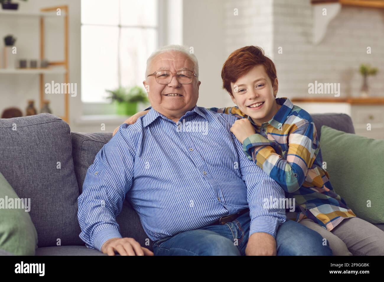 Happy grandparent and grandchildren at home concept Stock Photo - Alamy