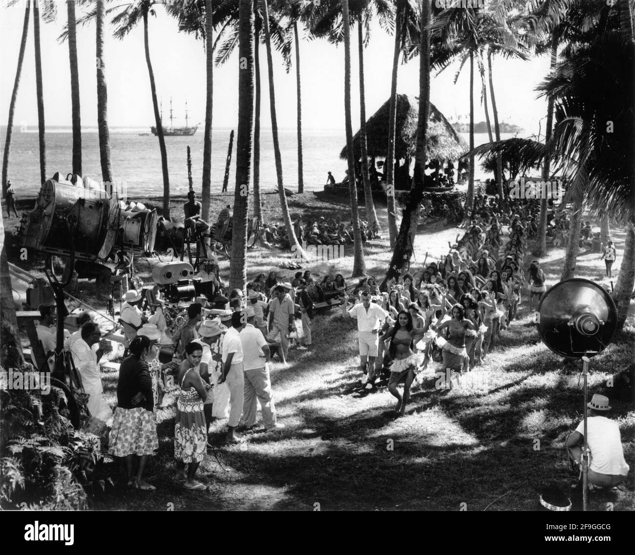 Film Crew filming / rehearsing Native dance sequence on set candid during location shooting of MUTINY ON THE BOUNTY 1962 directors LEWIS MILESTONE and CAROL REED (uncredited) novel James Nordhoff and James Norman Hall screenplay Charles Lederer Arcola Pictures / Metro Goldwyn Mayer Stock Photo