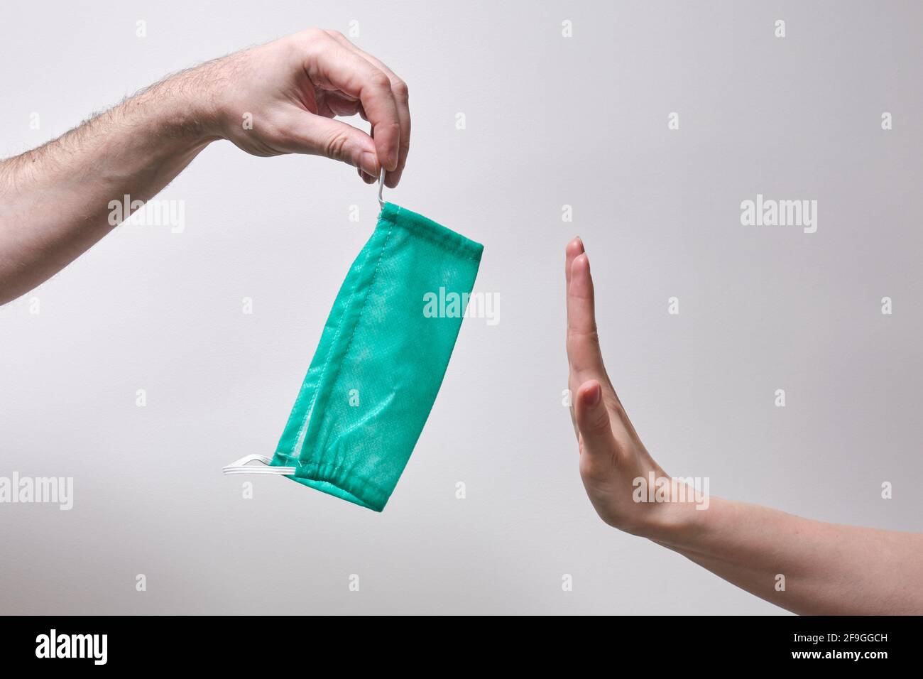 Refusal to wear a medical mask on the face Stock Photo Alamy