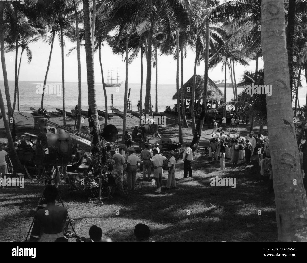 Film Crew filming / rehearsing Native dance sequence on set candid during location shooting of MUTINY ON THE BOUNTY 1962 directors LEWIS MILESTONE and CAROL REED (uncredited) novel James Nordhoff and James Norman Hall screenplay Charles Lederer Arcola Pictures / Metro Goldwyn Mayer Stock Photo
