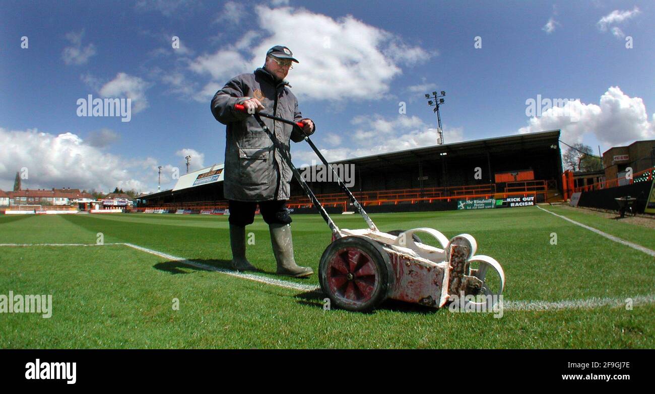 Football Club May 2001 Ron Sturgess, head groundsman goes over