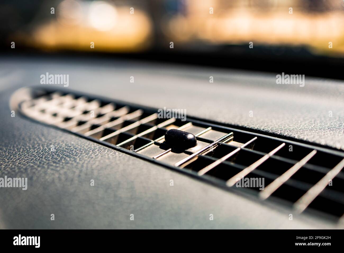Close-up of car ventilation system panel inside the vehicle Stock Photo