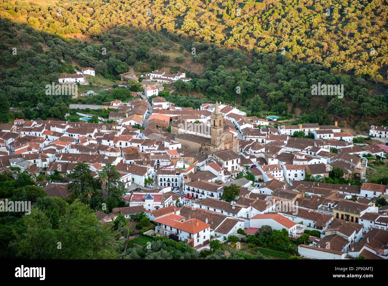 View over the village Alajar with the church Iglesia Parroquial de San Marcos, Huelva, Spain Stock Photo
