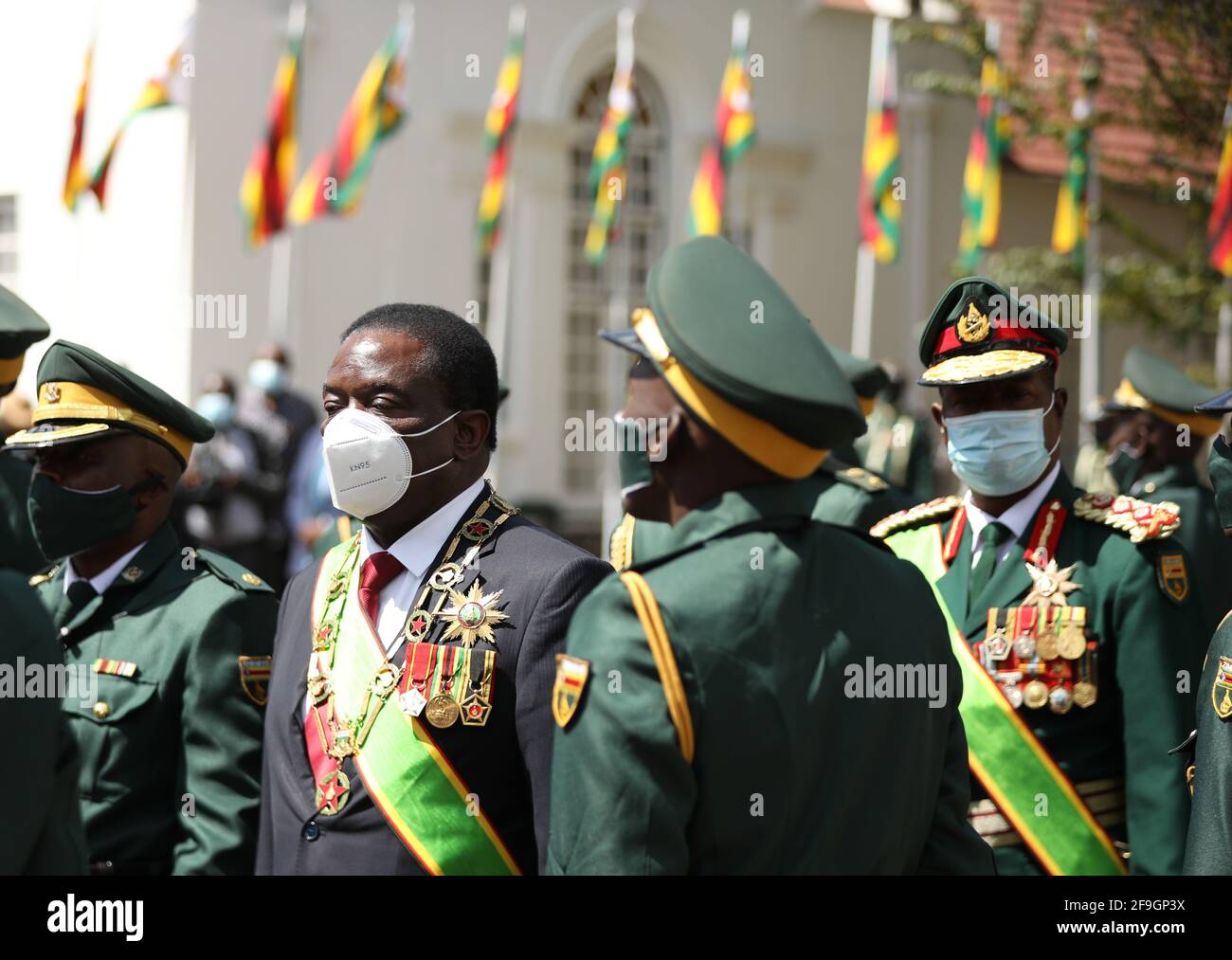 Harare, Zimbabwe. 18th Apr, 2021. Zimbabwean President Emmerson Mnangagwa (2nd L) inspects the army during a celebration marking the 41st anniversary of Zimbabwe's Independence at State House in Harare, Zimbabwe, on April 18, 2021. Zimbabwe marked its 41st independence anniversary on Sunday, with a call by President Emmerson Mnangagwa for the nation to keep safeguarding its sovereignty. Credit: Shaun Jusa/Xinhua/Alamy Live News Stock Photo