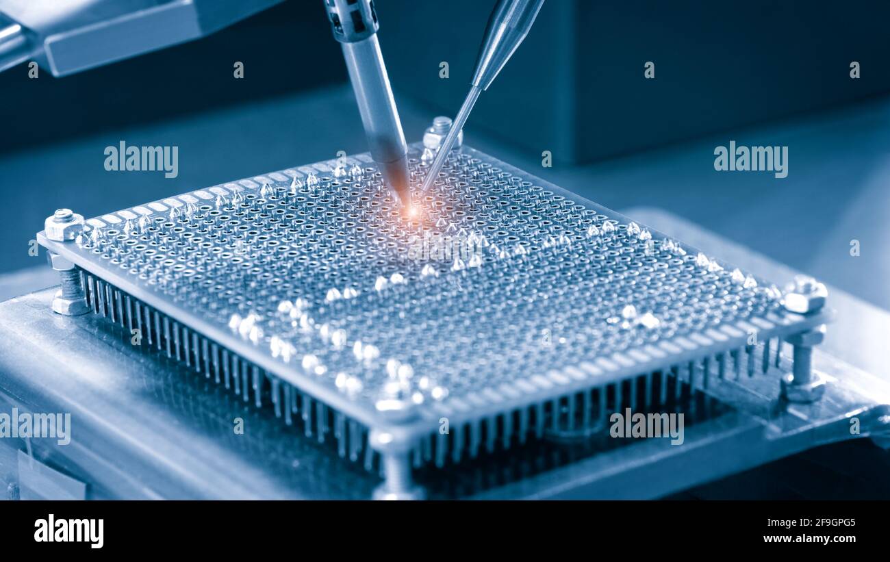 automatic machinery for soldering electronic components. soldering iron