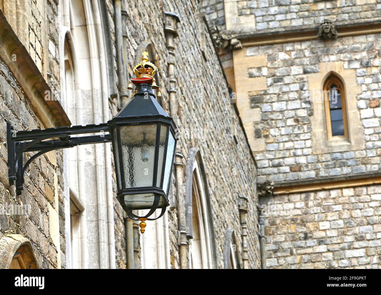 Vintage english street lamp on a stone wall at Windsor Castle Stock Photo -  Alamy