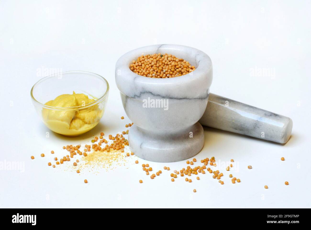 Bowl of mustard (Sinapis alba) , mustard seeds in mortar, mortar, mustard seeds, mustard seed Stock Photo
