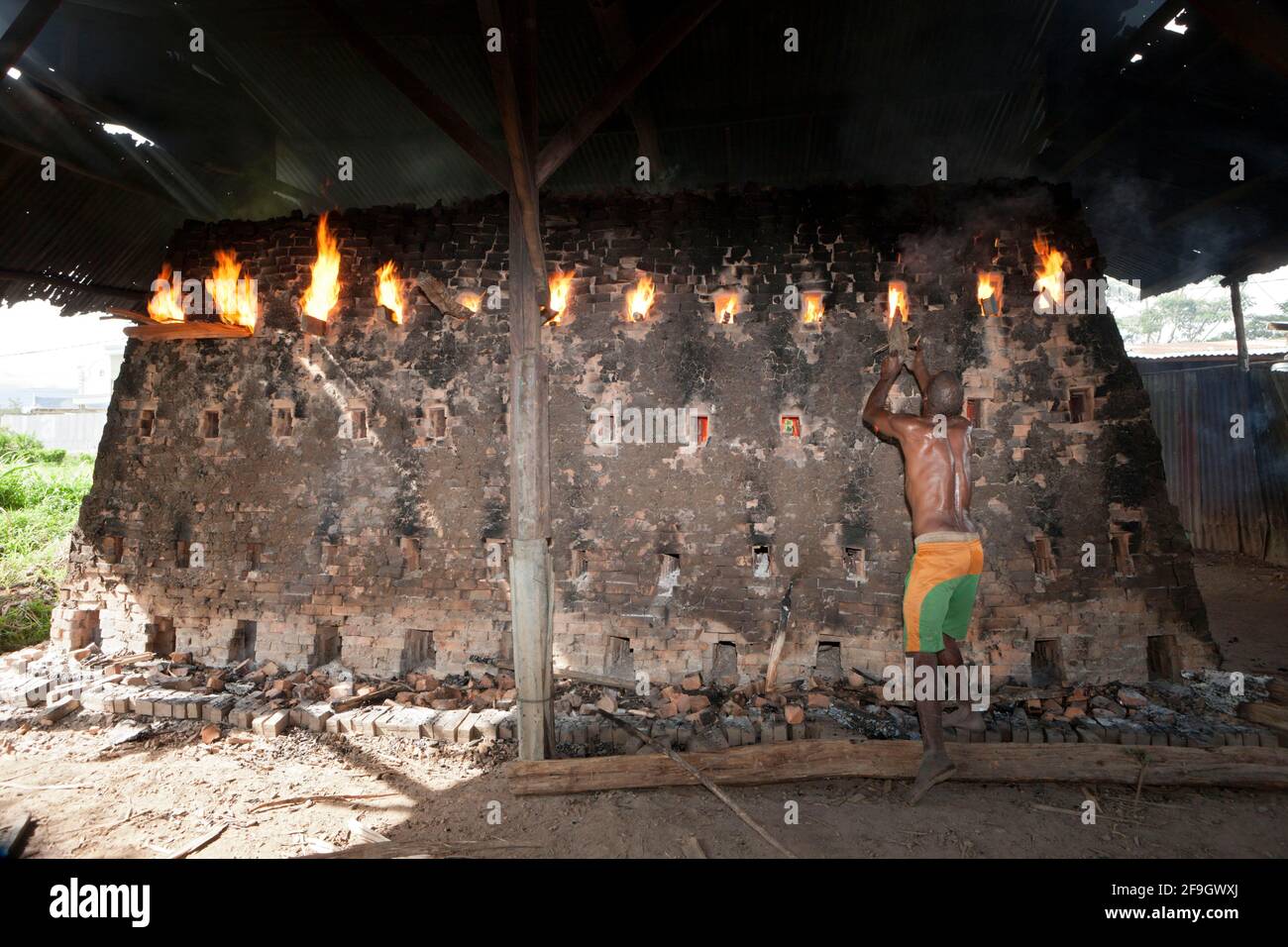 Worker in brickyard, Wamena, Baliem Valley, West Papua, Indonesia Stock Photo