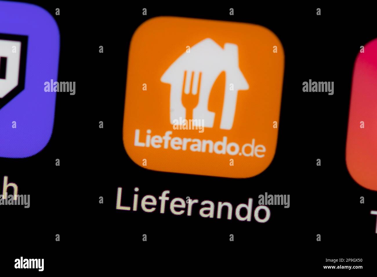 Lieferando, Logo, App-Icon, Anzeige auf einem Bildschirm vom Handy, Smartphone, Makroaufnahme, Detail, formatfuellend Stock Photo