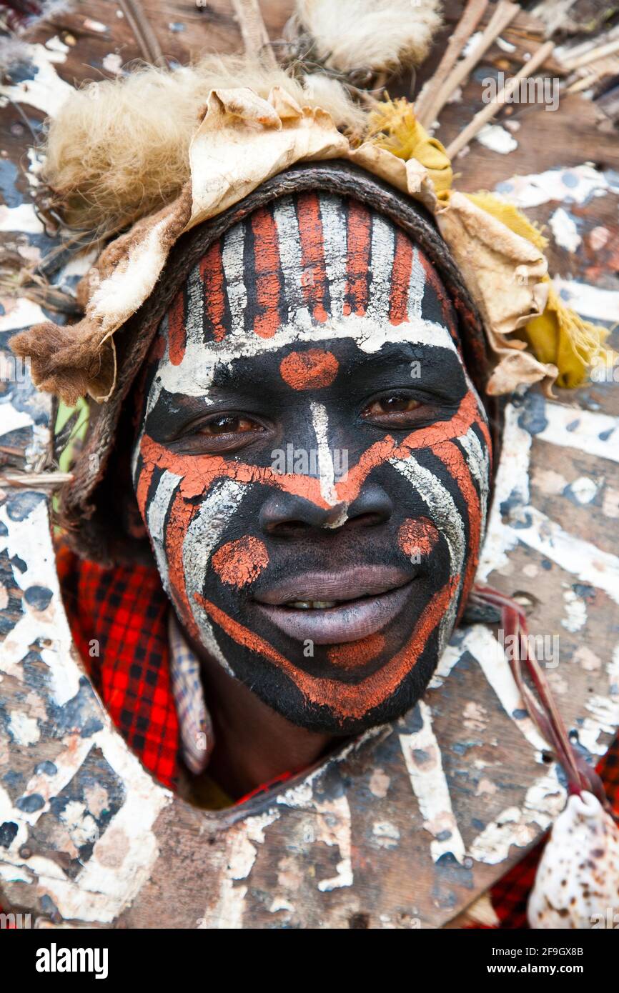Kikuyu man with face painting and headdress, Kenya Stock Photo Alamy