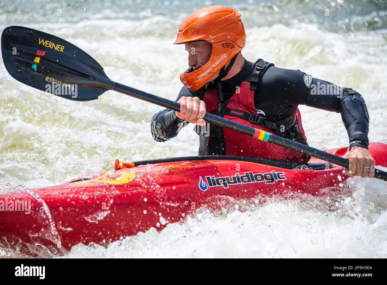 Freestyle whitewater kayaking on the Chattahoochee River in Columbus, Georgia. (USA) Stock Photo