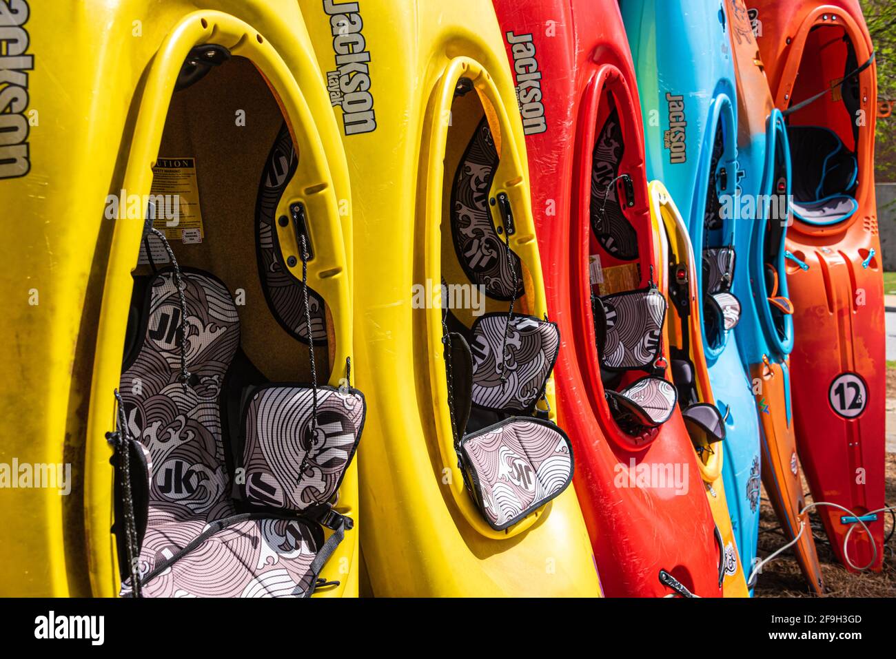 Colorful Jackson Kayaks at Whitewater Express along the Chattahoochee River in Columbus, Georgia. (USA) Stock Photo
