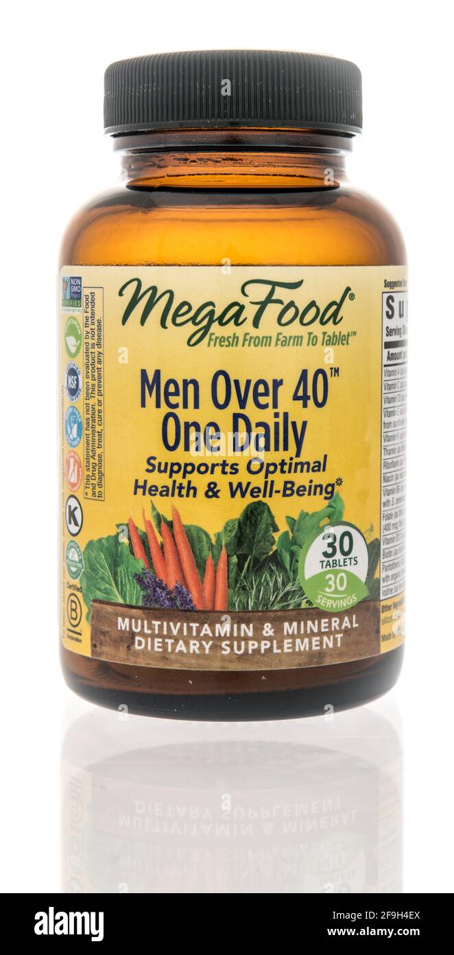 Winneconne, WI - 18 April 2021:  A package of Mega Food men over 40 one daily multivitamin supplement on an isolated background Stock Photo