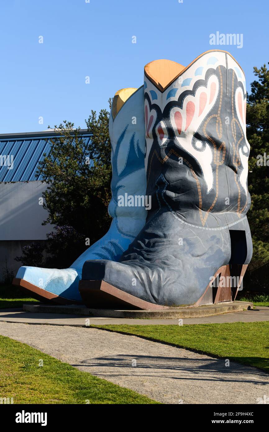 The oversized boots in Oxbow Park in the Georgetown neighborhood of Seattle are a reminder of the former extravagant Texaco gas station Stock Photo